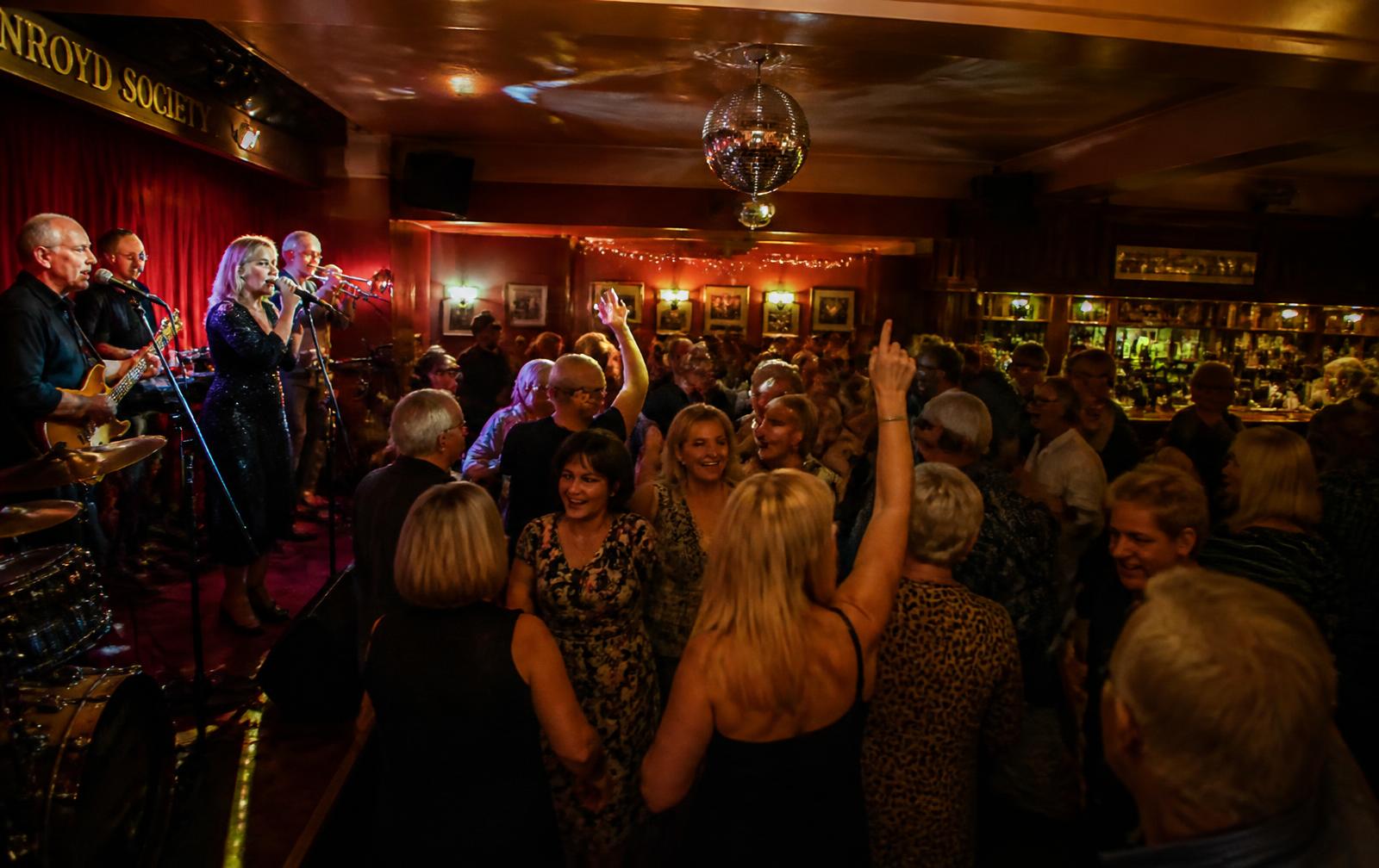 A packed party night with a live band on stage at Methil Club